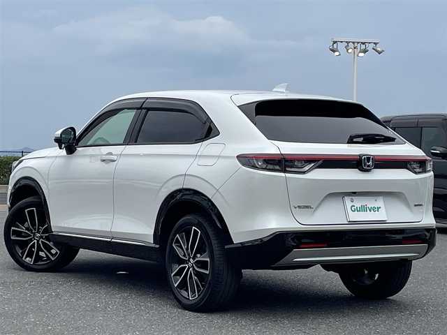 ホンダ ヴェゼル ハイブリッド e:HEV Z 島根県 2021(令3)年 6.5万km プラチナホワイトパール 登録時走行距離64887km/ワンオーナー/取扱説明書/保証書/純正ナビ/フルセグテレビ/バックカメラ/衝突軽減ブレーキ/レーダークルーズコントロール/ブラインドスポットモニター/プッシュスタート/前席シートヒーター/パワーバックドア/ハンドルヒーター/ヒルディセントコントロール/置くだけ充電/パドルシフト/LEDヘッドライト/前後ドライブレコーダー/ビルトインETC2.0/純正18インチアルミ
