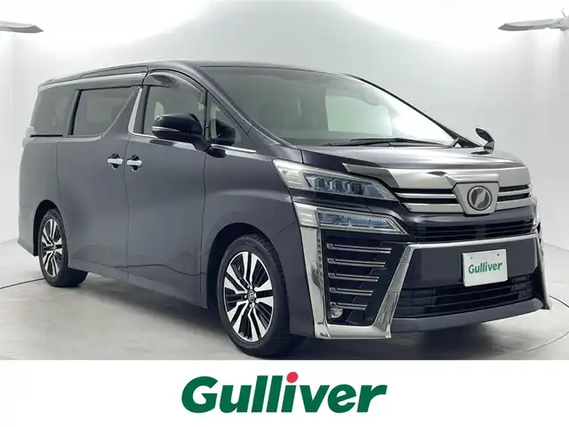 トヨタ ヴェルファイア Z Gエディション 福井県 2018(平30)年 7万km スパークリングブラックパールクリスタルシャイン 純正10インチナビNSZT-Z66T/（ＣＤ/ＤＶＤ/フルセグ/ＢＴ/ＳＤ）/純正フリップダウンモニター/ビルトインＥＴＣ　/運転席・助手席シートヒーター/運転席・助手席エアーシート/運転席・助手席パワーシート　/パワーバックドア/純正フロアマット/純正１８インチAW/クリアランスソナー/トヨタセーフティーセンス/プリクラッシュセーフティ/レーンキーピーングアシスト/レーンキープアシスト/アダブティブクルーズコントロール/ロードサインアシスト/オートマチックハイビーム/オートライト/LEDヘッドライト/フォグライト/スマートキー（スペアキー1本）/プッシュスタート/サイドバイザー