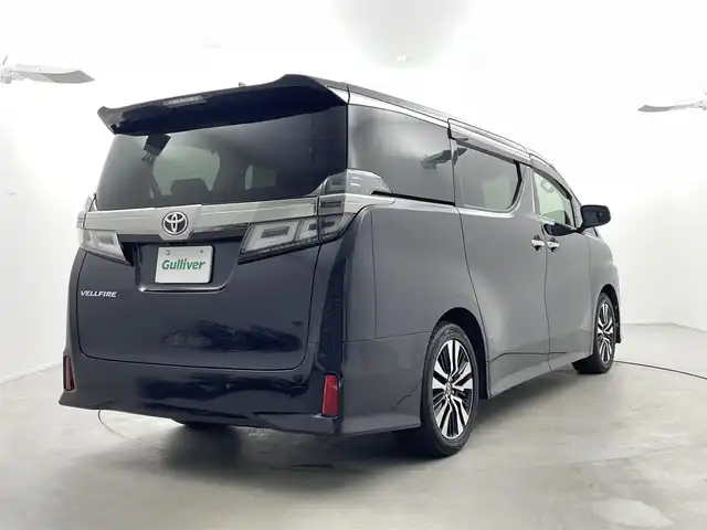 トヨタ ヴェルファイア Z Gエディション 福井県 2018(平30)年 7万km スパークリングブラックパールクリスタルシャイン 純正10インチナビNSZT-Z66T/（ＣＤ/ＤＶＤ/フルセグ/ＢＴ/ＳＤ）/純正フリップダウンモニター/ビルトインＥＴＣ　/運転席・助手席シートヒーター/運転席・助手席エアーシート/運転席・助手席パワーシート　/パワーバックドア/純正フロアマット/純正１８インチAW/クリアランスソナー/トヨタセーフティーセンス/プリクラッシュセーフティ/レーンキーピーングアシスト/レーンキープアシスト/アダブティブクルーズコントロール/ロードサインアシスト/オートマチックハイビーム/オートライト/LEDヘッドライト/フォグライト/スマートキー（スペアキー1本）/プッシュスタート/サイドバイザー