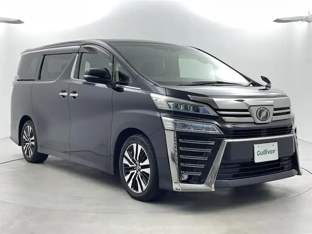 トヨタ ヴェルファイア Z Gエディション 福井県 2018(平30)年 7万km スパークリングブラックパールクリスタルシャイン 純正10インチナビNSZT-Z66T/（ＣＤ/ＤＶＤ/フルセグ/ＢＴ/ＳＤ）/純正フリップダウンモニター/ビルトインＥＴＣ　/運転席・助手席シートヒーター/運転席・助手席エアーシート/運転席・助手席パワーシート　/パワーバックドア/純正フロアマット/純正１８インチAW/クリアランスソナー/トヨタセーフティーセンス/プリクラッシュセーフティ/レーンキーピーングアシスト/レーンキープアシスト/アダブティブクルーズコントロール/ロードサインアシスト/オートマチックハイビーム/オートライト/LEDヘッドライト/フォグライト/スマートキー（スペアキー1本）/プッシュスタート/サイドバイザー