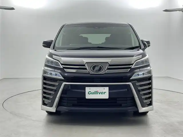 トヨタ ヴェルファイア Z Gエディション 福井県 2018(平30)年 7万km スパークリングブラックパールクリスタルシャイン 純正10インチナビNSZT-Z66T/（ＣＤ/ＤＶＤ/フルセグ/ＢＴ/ＳＤ）/純正フリップダウンモニター/ビルトインＥＴＣ　/運転席・助手席シートヒーター/運転席・助手席エアーシート/運転席・助手席パワーシート　/パワーバックドア/純正フロアマット/純正１８インチAW/クリアランスソナー/トヨタセーフティーセンス/プリクラッシュセーフティ/レーンキーピーングアシスト/レーンキープアシスト/アダブティブクルーズコントロール/ロードサインアシスト/オートマチックハイビーム/オートライト/LEDヘッドライト/フォグライト/スマートキー（スペアキー1本）/プッシュスタート/サイドバイザー
