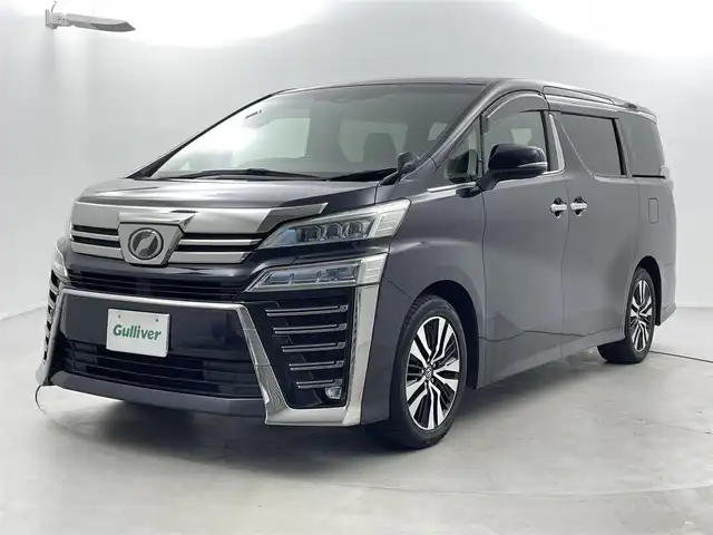 トヨタ ヴェルファイア Z Gエディション 福井県 2018(平30)年 7万km スパークリングブラックパールクリスタルシャイン 純正10インチナビNSZT-Z66T/（ＣＤ/ＤＶＤ/フルセグ/ＢＴ/ＳＤ）/純正フリップダウンモニター/ビルトインＥＴＣ　/運転席・助手席シートヒーター/運転席・助手席エアーシート/運転席・助手席パワーシート　/パワーバックドア/純正フロアマット/純正１８インチAW/クリアランスソナー/トヨタセーフティーセンス/プリクラッシュセーフティ/レーンキーピーングアシスト/レーンキープアシスト/アダブティブクルーズコントロール/ロードサインアシスト/オートマチックハイビーム/オートライト/LEDヘッドライト/フォグライト/スマートキー（スペアキー1本）/プッシュスタート/サイドバイザー