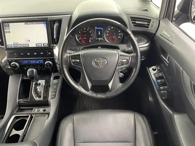 トヨタ ヴェルファイア Z Gエディション 福井県 2018(平30)年 7万km スパークリングブラックパールクリスタルシャイン 純正10インチナビNSZT-Z66T/（ＣＤ/ＤＶＤ/フルセグ/ＢＴ/ＳＤ）/純正フリップダウンモニター/ビルトインＥＴＣ　/運転席・助手席シートヒーター/運転席・助手席エアーシート/運転席・助手席パワーシート　/パワーバックドア/純正フロアマット/純正１８インチAW/クリアランスソナー/トヨタセーフティーセンス/プリクラッシュセーフティ/レーンキーピーングアシスト/レーンキープアシスト/アダブティブクルーズコントロール/ロードサインアシスト/オートマチックハイビーム/オートライト/LEDヘッドライト/フォグライト/スマートキー（スペアキー1本）/プッシュスタート/サイドバイザー