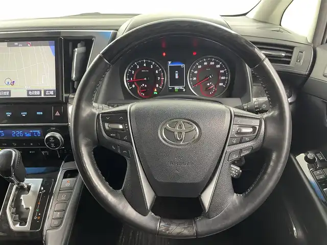 トヨタ ヴェルファイア Z Gエディション 福井県 2018(平30)年 7万km スパークリングブラックパールクリスタルシャイン 純正10インチナビNSZT-Z66T/（ＣＤ/ＤＶＤ/フルセグ/ＢＴ/ＳＤ）/純正フリップダウンモニター/ビルトインＥＴＣ　/運転席・助手席シートヒーター/運転席・助手席エアーシート/運転席・助手席パワーシート　/パワーバックドア/純正フロアマット/純正１８インチAW/クリアランスソナー/トヨタセーフティーセンス/プリクラッシュセーフティ/レーンキーピーングアシスト/レーンキープアシスト/アダブティブクルーズコントロール/ロードサインアシスト/オートマチックハイビーム/オートライト/LEDヘッドライト/フォグライト/スマートキー（スペアキー1本）/プッシュスタート/サイドバイザー