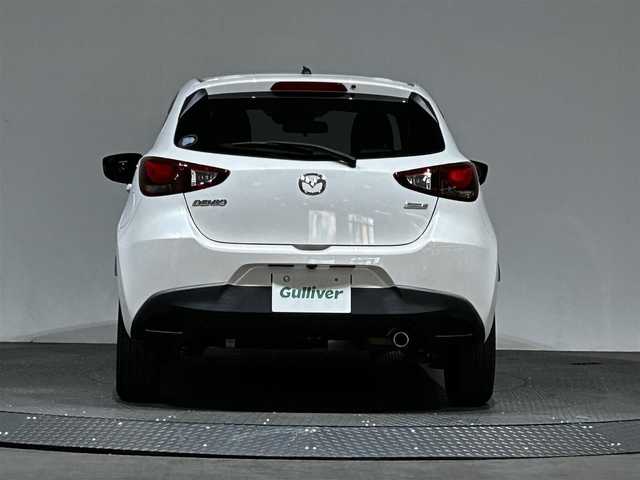 マツダ デミオ XD ツーリング Lパッケージ 愛媛県 2015(平27)年 4.4万km スノーフレイクホワイトパールマイカ ・純正ナビ（ワンセグＴＶ・ＢＴオーディオ・ＣＤＤＶＤ・ＦＭ・ＡＭ・ＡＵＸ）/・バックカメラ　/・ＵＳＢ接続　/・ＥＴＣ　/・クルーズコントロール　/・オートライト　/・ステアリングリモコン　/・ブラインドスポットモニター/・衝突軽減ブレーキ/・車検逸脱警報/・スペアキー/・ヘッドアップディスプレイ