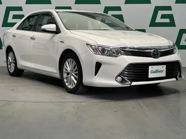 トヨタ カムリ ハイブリット Gパッケージ 鹿児島県 2014(平26)年 3.7万km ホワイトパールクリスタルシャイン 純正ナビ【B9072】　/バックカメラ　/トヨタセーフティセンス　/ブラインドスポットモニター　/置くだけ充電　/革巻きステアリング　/ステアリングリモコン　/オールオートウィンドウ　/自動防眩式インナーミラー　/純正ドアバイザー/禁煙車