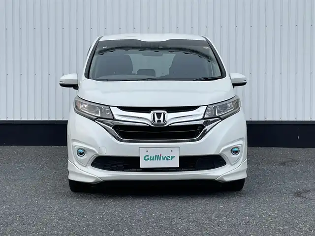 ホンダ フリード G ホンダセンシング 千葉県 2018(平30)年 4万km ホワイトオーキッドパール 純正メモリナビ/(フルセグTV CD DVD BT FM AM)/ナビ連動ドライブレコーダー/バックカメラ/衝突被害軽減システム/車線逸脱警報/クルーズコントロール/ハーフレザーシート/両側パワースライドドア/横滑り防止装置/ビルトインETC/アイドリングストップ/LEDヘッドライト/フォグランプ/オートライト/ウィンカーミラー/電動格納ミラー/純正15インチAW/シートリフター/プッシュスタート/スマートキー/フロアマット/ドアバイザー/取扱説明書/保証書/モデューロエアロ（F/S）