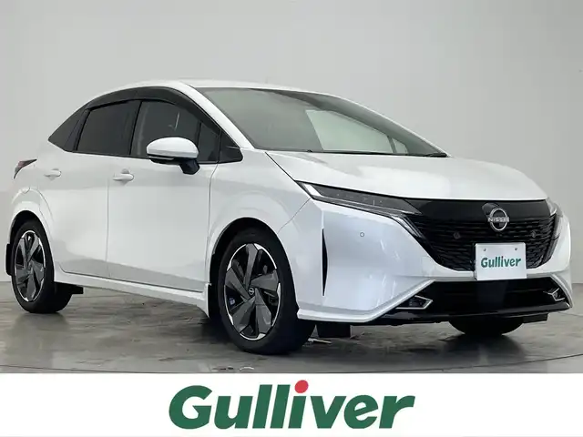 日産 オーラ G レザーエディション 神奈川県 2023(令5)年 1.2万km ピュアホワイトパール 純正9インチナビ/黒レザーシート/インテリジェントルームミラー/全方位カメラ/BOSEサウンド/ブラインドスポットモニター/オートマチックハイビーム/電子パーキング/オートホールド/Bluetooth/USB/HDMI/フルセグ/前後ドライブレコーダー/ステアリングリモコン/プッシュスタート/ワイヤレス充電