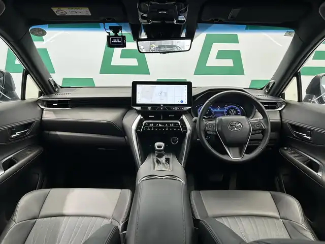トヨタ ハリアー Z 鹿児島県 2024(令6)年 1.5万km プレシャスブラックパール メーカーOPナビ/パノラミックビューモニター/トヨタセーフティセンス/プリクラッシュセーフティ/レーントレーシングアシスト/レーダークルーズコントロール/アダプティブハイビームシステム/ロードサインアシスト/置くだけ充電/JBLサウンド/ブラインドスポットモニター/ヘッドアップディスプレイ/フルセグTV（TVキャンセラー付き）/自動防眩式インナーミラー（ドラレコ付き）/ビルトインETC2.0/ハーフレザーシート/運転席シートヒーター/革巻きステアリング/純正フロアマット