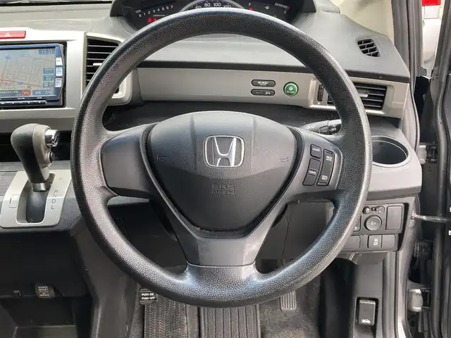 ホンダ フリード G ジャストセレクション 鳥取県 2012(平24)年 14.8万km ポリッシュドメタルメタリック 登録時走行距離：147821km/ディーラー純正ナビ/　CD DVD BT フルセグTV/バックカメラ/クルーズコントロール/両側パワースライドドア/HIDヘッドライト/オートライト/純正フロアマット/ドアバイザー/新車時保証書/ワンオーナー