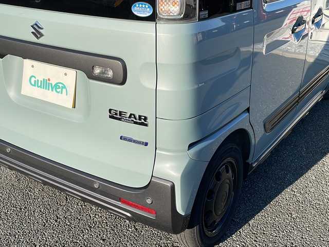 スズキ スペーシア ギア HYBRID XZターボ 福岡県 2019(令1)年 9.1万km オフブルーメタリック/ガンメタリック2トーンルーフ 純正8インチナビ/【AM/FM/CD/DVD/SD/BT/USB/フルセグTV】/社外10.1インチ後席モニター【RSA10S-L-S】/バックカメラ/ETC/ルーフキャリア/後席送風機/電動格納ミラー/前席シートヒーター/LEDヘッドライト＆フォグランプ/ステアリングスイッチ/パドルシフト/TVキャンセラー/後席サンシェード/後席用テーブル