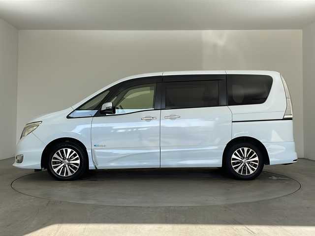 日産 セレナ ハイウェイスター Sハイブリッド 兵庫県 2014(平26)年 8.7万km ブルームーンホワイトP ・純正SDナビ（CD・DVD・BT・ワンセグ・USB・AUX・ipod）/・バックカメラ/・ビルトインETC/・片側パワースライドドア/・ドライブレコーダー/・クルーズコントロール/・衝突軽減ブレーキ/・横滑り防止装置/・車線逸脱警報装置/・オートライト/・アイドリングストップ/・純正フロアマット/・純正16インチアルミホイール/・保証書/・取扱説明書