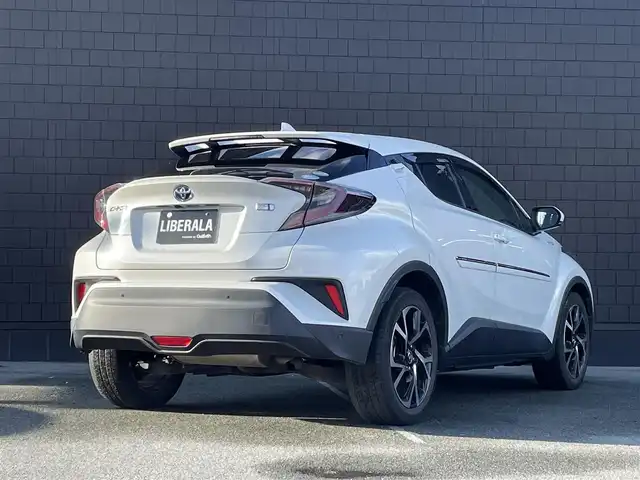 トヨタ Ｃ－ＨＲ G 三重県 2017(平29)年 5.1万km ホワイトパールクリスタルシャイン 純正９型ナビ　/バックカメラ　/セーフセンス　/ドライブレコーダー　/シートヒーター　/ＬＥＤヘッドライト　/寒冷地仕様　/ＡＣＣ　/ブラインドスポット　/ハーフレザーシート　/純正１８インチアルミ　/ＡＣ１００Ｖ電源