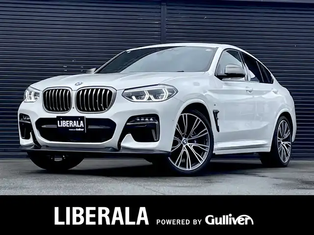ＢＭＷ Ｘ４ M40i 三重県 2020(令2)年 3.9万km アルピンホワイトⅢ ＯＰ２１インチＡＷ　/茶革　/３Ｄデザインエアロ（フロント・リア・リアアンダー）/バイパーエンスタ　/カープレイ　/アンビエトライト　/サンルーフ　/純正前後ドラレコ　/直６ツインターボ　/ハーマンカードン　/純正ナビ　/全方位カメラ　/シートベンチ