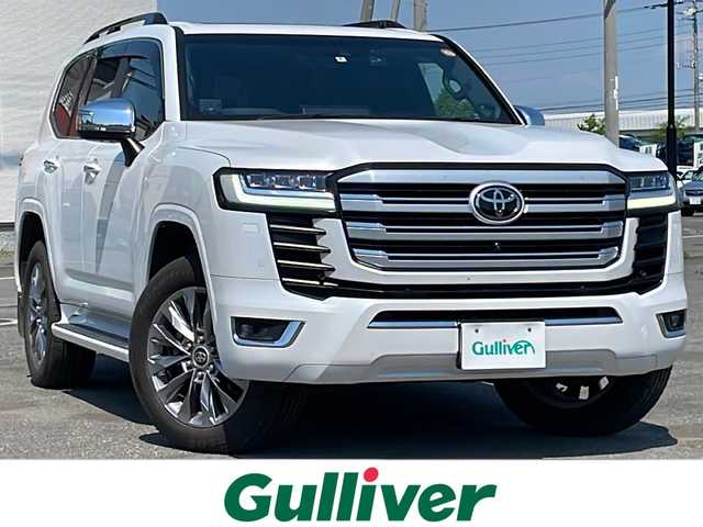 トヨタ ランドクルーザー ZX 道央・札幌 2022(令4)年 5.1万km プレシャスホワイトパール ４WD/ワンオーナー/寒冷地仕様/JBLプレミアムサウンドシステム/純正ディーラーOPナビ/CD/DVD/BT/フルセグ/純正後席モニター/トヨタセーフティセンス/プリクラッシュセーフティ/横滑り防止装置/レーダークルーズコントロール/ダウンヒルアシストコントロール/レーンキープアシスト/クリアランスソナー/ブラインドスポットモニター/パノラミックビューモニター/ビルトインETC2.0/ドライブレコーダー/トランスファ切替/センターデフロック/DRIVEMODE切替/サンルーフ/パワーバックドア/前席パワーシート/全席シートヒーター/全席エアシート/D席メモリーシート/レザーシート/革巻きウッドコンビステアリング/ステアリングリモコン/ハンドルヒーター/AC100V/電動パーキング/ブレーキホールド/自動防眩ミラー/プッシュスタート/スマートキー/LEDヘッドライト/オートライト/オートハイビーム/フォグランプ/電動格納ミラー/ウィンカーミラー/純正フロアマット/ドアバイザー/スペアキー/社外セキュリティ