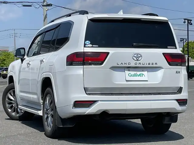 トヨタ ランドクルーザー ZX 道央・札幌 2022(令4)年 5.1万km プレシャスホワイトパール ４WD/ワンオーナー/寒冷地仕様/JBLプレミアムサウンドシステム/純正ディーラーOPナビ/CD/DVD/BT/フルセグ/純正後席モニター/トヨタセーフティセンス/プリクラッシュセーフティ/横滑り防止装置/レーダークルーズコントロール/ダウンヒルアシストコントロール/レーンキープアシスト/クリアランスソナー/ブラインドスポットモニター/パノラミックビューモニター/ビルトインETC2.0/ドライブレコーダー/トランスファ切替/センターデフロック/DRIVEMODE切替/サンルーフ/パワーバックドア/前席パワーシート/全席シートヒーター/全席エアシート/D席メモリーシート/レザーシート/革巻きウッドコンビステアリング/ステアリングリモコン/ハンドルヒーター/AC100V/電動パーキング/ブレーキホールド/自動防眩ミラー/プッシュスタート/スマートキー/LEDヘッドライト/オートライト/オートハイビーム/フォグランプ/電動格納ミラー/ウィンカーミラー/純正フロアマット/ドアバイザー/スペアキー/社外セキュリティ