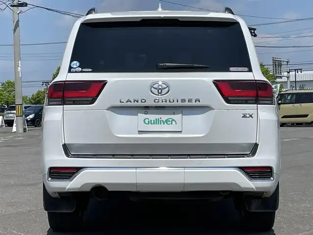 トヨタ ランドクルーザー ZX 道央・札幌 2022(令4)年 5.1万km プレシャスホワイトパール ４WD/ワンオーナー/寒冷地仕様/JBLプレミアムサウンドシステム/純正ディーラーOPナビ/CD/DVD/BT/フルセグ/純正後席モニター/トヨタセーフティセンス/プリクラッシュセーフティ/横滑り防止装置/レーダークルーズコントロール/ダウンヒルアシストコントロール/レーンキープアシスト/クリアランスソナー/ブラインドスポットモニター/パノラミックビューモニター/ビルトインETC2.0/ドライブレコーダー/トランスファ切替/センターデフロック/DRIVEMODE切替/サンルーフ/パワーバックドア/前席パワーシート/全席シートヒーター/全席エアシート/D席メモリーシート/レザーシート/革巻きウッドコンビステアリング/ステアリングリモコン/ハンドルヒーター/AC100V/電動パーキング/ブレーキホールド/自動防眩ミラー/プッシュスタート/スマートキー/LEDヘッドライト/オートライト/オートハイビーム/フォグランプ/電動格納ミラー/ウィンカーミラー/純正フロアマット/ドアバイザー/スペアキー/社外セキュリティ
