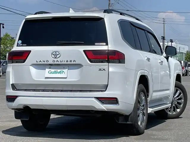 トヨタ ランドクルーザー ZX 道央・札幌 2022(令4)年 5.1万km プレシャスホワイトパール ４WD/ワンオーナー/寒冷地仕様/JBLプレミアムサウンドシステム/純正ディーラーOPナビ/CD/DVD/BT/フルセグ/純正後席モニター/トヨタセーフティセンス/プリクラッシュセーフティ/横滑り防止装置/レーダークルーズコントロール/ダウンヒルアシストコントロール/レーンキープアシスト/クリアランスソナー/ブラインドスポットモニター/パノラミックビューモニター/ビルトインETC2.0/ドライブレコーダー/トランスファ切替/センターデフロック/DRIVEMODE切替/サンルーフ/パワーバックドア/前席パワーシート/全席シートヒーター/全席エアシート/D席メモリーシート/レザーシート/革巻きウッドコンビステアリング/ステアリングリモコン/ハンドルヒーター/AC100V/電動パーキング/ブレーキホールド/自動防眩ミラー/プッシュスタート/スマートキー/LEDヘッドライト/オートライト/オートハイビーム/フォグランプ/電動格納ミラー/ウィンカーミラー/純正フロアマット/ドアバイザー/スペアキー/社外セキュリティ