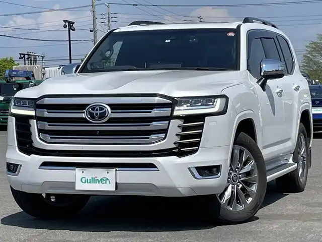 トヨタ ランドクルーザー ZX 道央・札幌 2022(令4)年 5.1万km プレシャスホワイトパール ４WD/ワンオーナー/寒冷地仕様/JBLプレミアムサウンドシステム/純正ディーラーOPナビ/CD/DVD/BT/フルセグ/純正後席モニター/トヨタセーフティセンス/プリクラッシュセーフティ/横滑り防止装置/レーダークルーズコントロール/ダウンヒルアシストコントロール/レーンキープアシスト/クリアランスソナー/ブラインドスポットモニター/パノラミックビューモニター/ビルトインETC2.0/ドライブレコーダー/トランスファ切替/センターデフロック/DRIVEMODE切替/サンルーフ/パワーバックドア/前席パワーシート/全席シートヒーター/全席エアシート/D席メモリーシート/レザーシート/革巻きウッドコンビステアリング/ステアリングリモコン/ハンドルヒーター/AC100V/電動パーキング/ブレーキホールド/自動防眩ミラー/プッシュスタート/スマートキー/LEDヘッドライト/オートライト/オートハイビーム/フォグランプ/電動格納ミラー/ウィンカーミラー/純正フロアマット/ドアバイザー/スペアキー/社外セキュリティ