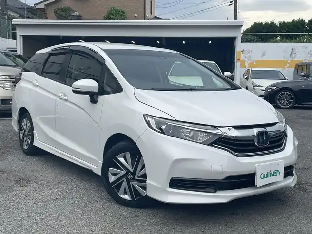 ホンダ シャトル G ホンダセンシング 神奈川県 2020(令2)年 2.2万km プラチナホワイトパール 社外メモリーナビ/・ワンセグTV/CD/バックカメラ/ビルトインETC/ドライブレコーダー/ホンダセンシング/レーダークルーズコントロール/スマートキー/LEDヘッドライト/横滑り防止装置/ドアバイザー/純正フロアマット/保証書/取扱説明書/スペアキー×1