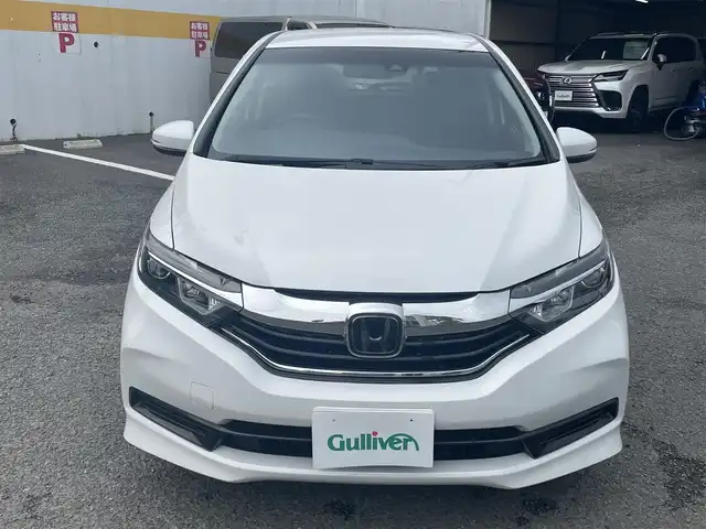 ホンダ シャトル G ホンダセンシング 神奈川県 2020(令2)年 2.2万km プラチナホワイトパール 社外メモリーナビ/・ワンセグTV/CD/バックカメラ/ビルトインETC/ドライブレコーダー/ホンダセンシング/レーダークルーズコントロール/スマートキー/LEDヘッドライト/横滑り防止装置/ドアバイザー/純正フロアマット/保証書/取扱説明書/スペアキー×1