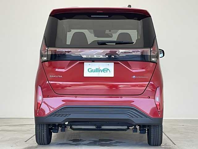 日産 サクラ X 愛知県 2023(令5)年 0.7万km スパークリングレッドM 衝突軽減システム/純正9型ディズプレイオーディオ　ナビ機能なし/Bluetooth/バックカメラ/コーナーセンサー/純正アルミホイール/LEDヘッドライト/ETC/ステアリングスイッチ/スマートキー/プッシュスタート