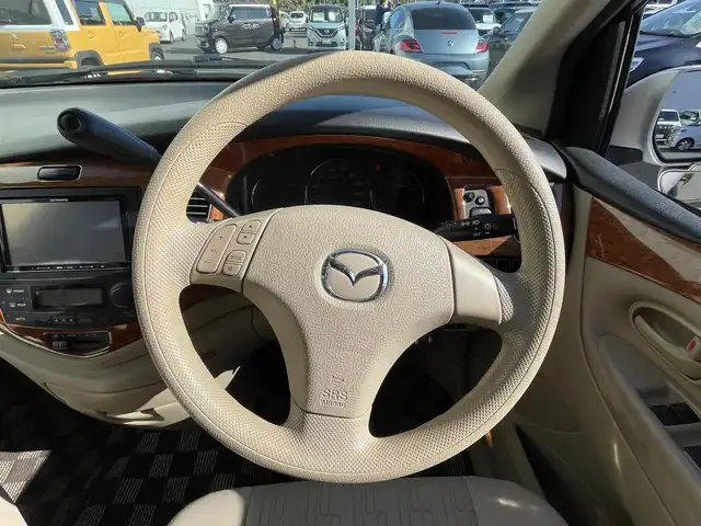 マツダ ＭＰＶ スポーツ 千葉県 2005(平17)年 6万km サンライトシルバーメタリック 社外７インチナビ/後席フリップダウンモニター/ワンセグＴＶ/両側パワースライドドア/Ｂｌｕｅｔｏｏｔｈ/電格ミラー/ステアリングスイッチ/スマートキー/社外アルミホイール/パワーウィンドウ