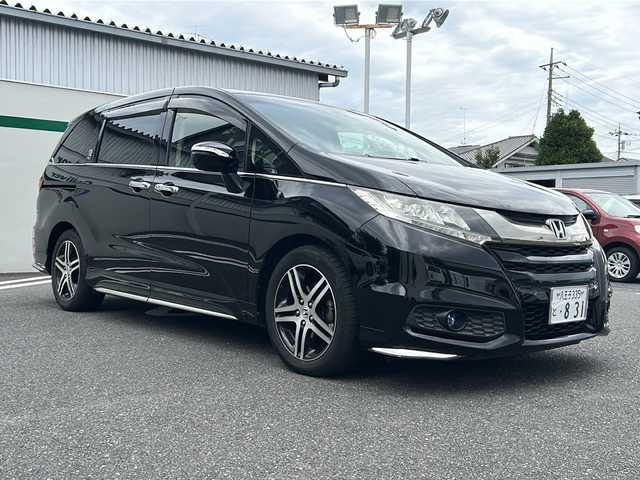 ホンダ オデッセイ アブソルート 20thアニバーサリー 東京都 2015(平27)年 7.4万km クリスタルブラックパール 純正ナビ/・Bluetooth/TV/CD/DVD/USB/HONDA　SENSING/・衝突軽減ブレーキ/・誤発進抑制機能・/・先行車発進お知らせ機能/・標識認識機能/・車線維持支援システム/・路外逸脱抑制機能/・アダプティブ・クルーズ・コントロール/レーンアシスト/横滑り防止装置/盗難防止装置/衝突被害軽減システム/パーワースライドドア/バックカメラ/ＬＥＤヘッドライト/オートライト/パワーシート/ドアバイザー/ETC/取扱説明書/保証書/スペアキー1本