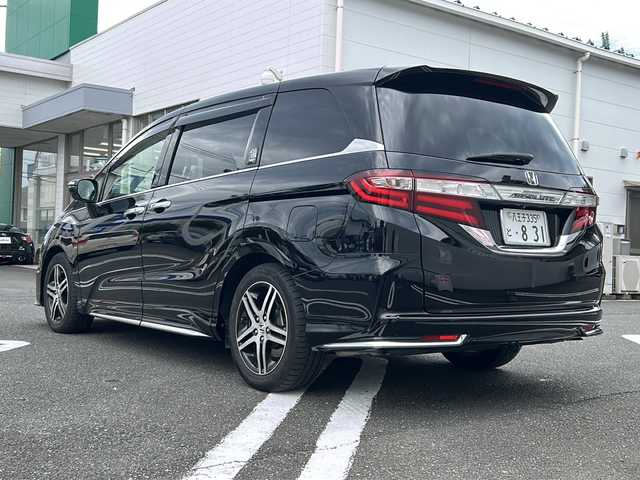 ホンダ オデッセイ アブソルート 20thアニバーサリー 東京都 2015(平27)年 7.4万km クリスタルブラックパール 純正ナビ/・Bluetooth/TV/CD/DVD/USB/HONDA　SENSING/・衝突軽減ブレーキ/・誤発進抑制機能・/・先行車発進お知らせ機能/・標識認識機能/・車線維持支援システム/・路外逸脱抑制機能/・アダプティブ・クルーズ・コントロール/レーンアシスト/横滑り防止装置/盗難防止装置/衝突被害軽減システム/パーワースライドドア/バックカメラ/ＬＥＤヘッドライト/オートライト/パワーシート/ドアバイザー/ETC/取扱説明書/保証書/スペアキー1本
