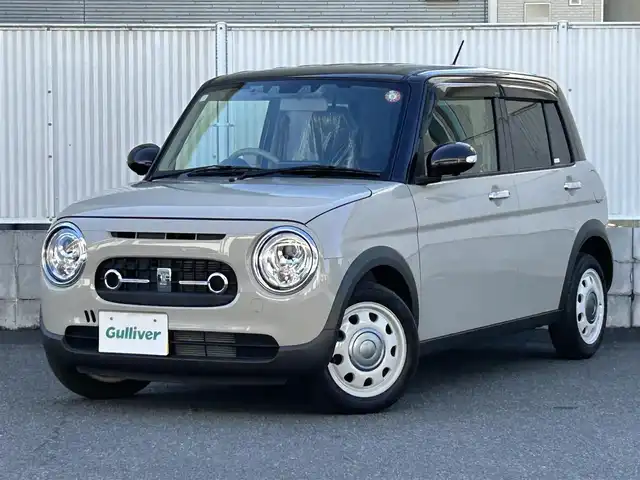 スズキ ラパン ＬＣ X 栃木県 2022(令4)年 2.5万km フォーンベージュメタリック/アーバンブラウン 2トーン 純正メモリナビ/(CD/DVD/BT/AM/FM)/フルセグTV/全周囲カメラ/ハーフレザーシート/シートヒーター/衝突被害軽減システム/車線逸脱警報/コーナーセンサー前後/ETC/LEDヘッドライト/オートライト/アイドリングストップ/ウィンカーミラー/電動格納ミラー/純正14インチAW/シートリフター/横滑り防止装置/プッシュスタート/スマートキー/フロアマット/ドアバイザー/取扱説明書/保証書