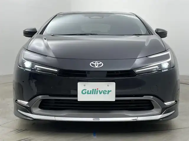 トヨタ プリウス 岡山県 2024(令6)年 1万km アティチュードブラックマイカ モデリスタエアロ　前・横・後下　/純正ディスプレイオーディオ/【BT/フルセグ/Carplay】/全方位カメラ　/レーダークルーズコントロール　/ＥＴＣ２．０　/シートヒーター　前席　/エアシート　前席　/ＬＥＤヘッドライト　/ワイヤレス充電　/デジタルインナーミラー　/ブラインドスポットモニター　/電動リアゲート/禁煙車/スペアキー×1/コーナーセンサー　前後/ステアリングヒーター/パーキングアシスト