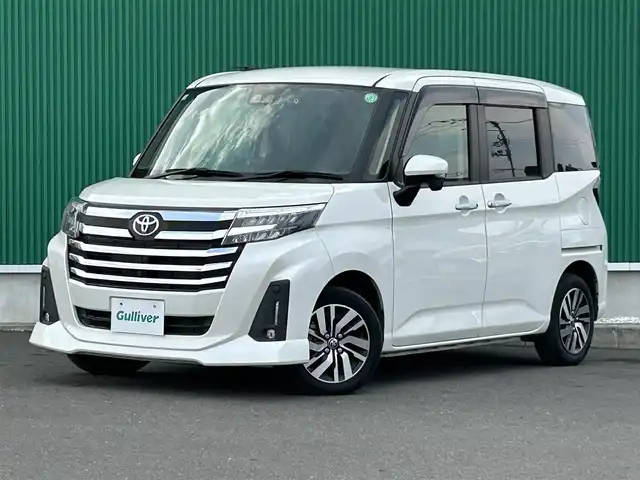 トヨタ ルーミー カスタムG 宮城県 2020(令2)年 2.7万km パールホワイトⅢ パノラミックビュー対応ナビレディパッケージ/・パノラミックビューモニター/・ステアリングスイッチ/＝＝＝/スマートアシスト/・衝突回避支援ブレーキ機能/・衝突警報機能/・車線逸脱警報機能/・ふらつき警報/・ブレーキ制御機能付誤発進抑制機能/・サイドビューランプ/・先行車発進お知らせ機能/・コーナーセンサー/・路側逸脱警報/・アダプティブドライビングビーム/・アダプティブクルーズコントロール/・標識認識機能/純正9インチナビ（NSZT-Y68T）/・CD/DVD/・Bluetooth/・フルセグTV/ビルトインETC/ドライブレコーダー/ウェルカムパワースライドドア（両側）/革巻きステアリング/電動パーキングブレーキ/ブレーキホールド/LEDヘッドランプ/フォグランプ/オートライト/スマートキー＆プッシュスタート/電動格納ミラー/純正14インチAW/純正フロアマット/純正ドアバイザー/Wエアバッグ