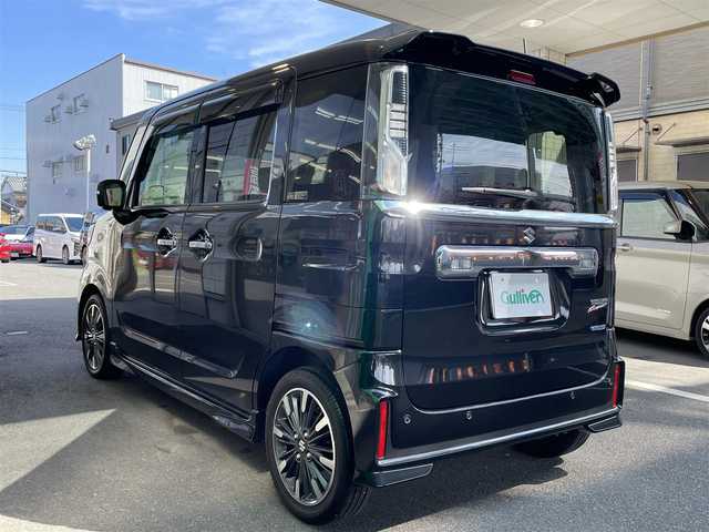 スズキ スペーシア カスタム HYBRID XS ターボ 愛知県 2022(令4)年 1.8万km ブルーイッシュブラックパール3 ワンオーナー/両側パワースライドドア/純正8型SDナビ〈Panasonic製CN-RZ875〉/・DVD／Bluetooth／地デジTV/バック／全方位カメラ/純正LEDヘッドライト／フォグランプ/合皮＆ファブリックコンビシート/ヘッドアップディスプレイ/パドルシフト/運転席シートヒーター/後席パーソナルテーブル/SUZUKI セーフティサポート/・デュアルカメラブレーキサポート/・誤発進抑制制御/・車線逸脱警報機能/・ふらつき警報機能/・先行車発進告知/・アダプティブクルーズコントロール/・後方誤発進抑制制御機能/・リアパーキングセンサー/・車線逸脱抑制機能/純正15インチAW/スマートキー＆プッシュスタート