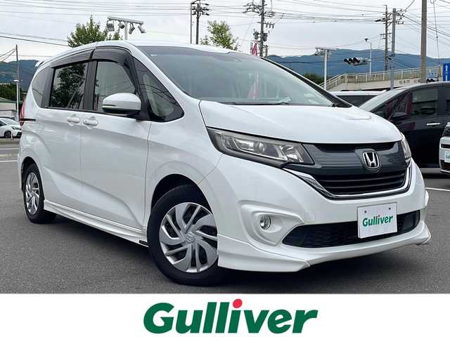 ホンダ フリード G ホンダセンシング 長野県 2018(平30)年 4.5万km ホワイトオーキッドパール エクリプスSDメモリナビ（AVN-R8）/FM・AM・DVD・CD・フルセグTV/Bluetooth Audio/バックカメラ/レーダークルーズコントロール/モデューロアエロ（F・S）/両側パワースライドドア/純正LEDヘッドライト/アイドリングストップ/プッシュスタート/ドアバイザー/スマートキー/オートライト/スペアキー/ETC