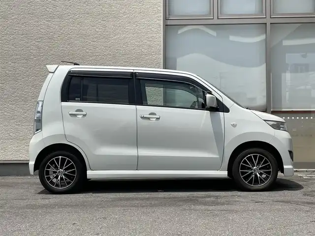 スズキ ワゴンＲ スティングレー X 大阪府 2010(平22)年 1.4万km パールホワイト 純正ナビ/(ワンセグ/CD/DVD)/電動格納ミラー/プッシュスタートボタン/社外１４インチアルミホイール/スマートキー/取扱説明書/保証書