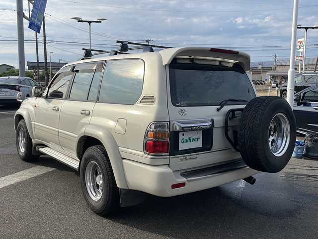 トヨタ ランドクルーザー VX－LTD Gセレクション 新潟県 2001(平13)年 18.2万km ホワイトパールマイカ 純正ナビ/前席シートヒーター/前席パワーシート/ベットキット/AHC/ETC/ルーフレール/保証書/取扱説明書