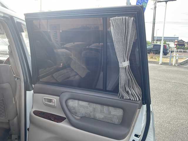 トヨタ ランドクルーザー VX－LTD Gセレクション 新潟県 2001(平13)年 18.2万km ホワイトパールマイカ 純正ナビ/前席シートヒーター/前席パワーシート/ベットキット/AHC/ETC/ルーフレール/保証書/取扱説明書