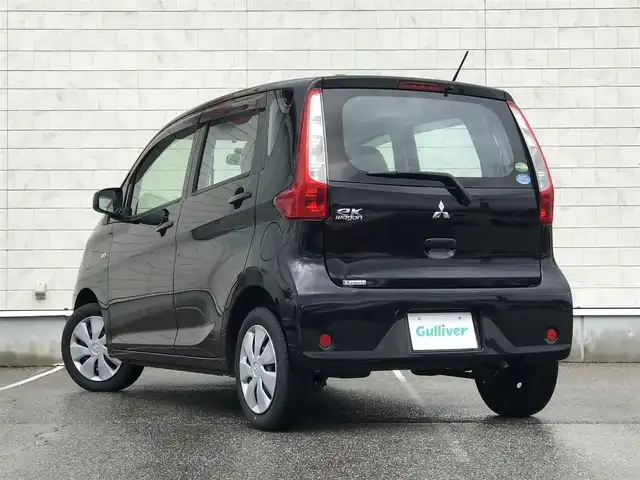 三菱 ｅＫワゴン E 富山県 2014(平26)年 4.5万km アメジストブラック スタッドレスタイヤ車載/社外ナビ/ワンセグTV/Bluetooth/リモコンキー/電動格納ミラー/ETC/ヘッドライトレベライザー/ベンチシート/ドアバイザー/パワーウインドウ/パワーステアリング