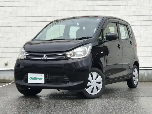 三菱 ｅＫワゴン E 富山県 2014(平26)年 4.5万km アメジストブラック スタッドレスタイヤ車載/社外ナビ/ワンセグTV/Bluetooth/リモコンキー/電動格納ミラー/ETC/ヘッドライトレベライザー/ベンチシート/ドアバイザー/パワーウインドウ/パワーステアリング