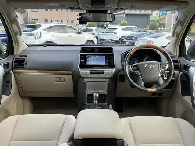 トヨタ ランドクルーザー プラド TX 三重県 2018(平30)年 5.1万km ホワイトパールクリスタルシャイン ワンオーナー /♪登録時走行距離50372km/♪サンルーフ/♪RAYS製17インチアルミホイール/♪ターボ/♪ルーフレール/♪ヒッチメンバー/♪リアラダー/♪リフトアップ/♪純正部品有り(スプリング・ショック)/♪トヨタセーフティセンス/　・PCS (プリクラッシュセーフティ)/　・LDA (レーンディパーチャーアラート)/　・レーダークルーズコントロール/♪ストラーダナビ/　・フルセグ・Bluetooth/　・DVD/CD再生・録音・USB/♪バックカメラ/♪2ndスタート/♪スマートキーx２/♪プッシュスタート/♪LEDヘッドライト/♪LEDフォグライト /♪オートマチックハイビーム/♪オートライト/♪革巻きステアリング/♪ステアリングスイッチ/♪ドライブレコーダー/♪電動格納ミラー/♪ウィンカーミラー/♪フロアマット/♪スペアタイヤ/♪ダウンヒルアシスト/♪横滑り防止機能/♪サイド/カーテン/ニーエアバック