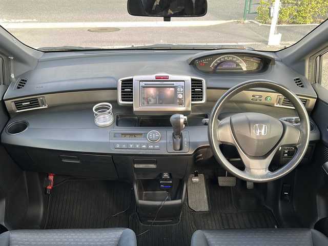 ホンダ フリード スパイク G ジャストセレクション 東京都 2012(平24)年 9.1万km モダンスティールM 純正メモリナビ　型式：VXM-128VS/【TV/DVD/CD/USB/SD】/パワースライドドア/ETC/ドライブレコーダー/ＨＩＤオートライト/横滑り防止装置/電動格納ミラー/スタッドレスタイヤ積込