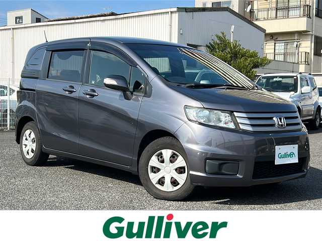 ホンダ フリード スパイク G ジャストセレクション 東京都 2012(平24)年 9.1万km モダンスティールM 純正メモリナビ　型式：VXM-128VS/【TV/DVD/CD/USB/SD】/パワースライドドア/ETC/ドライブレコーダー/ＨＩＤオートライト/横滑り防止装置/電動格納ミラー/スタッドレスタイヤ積込