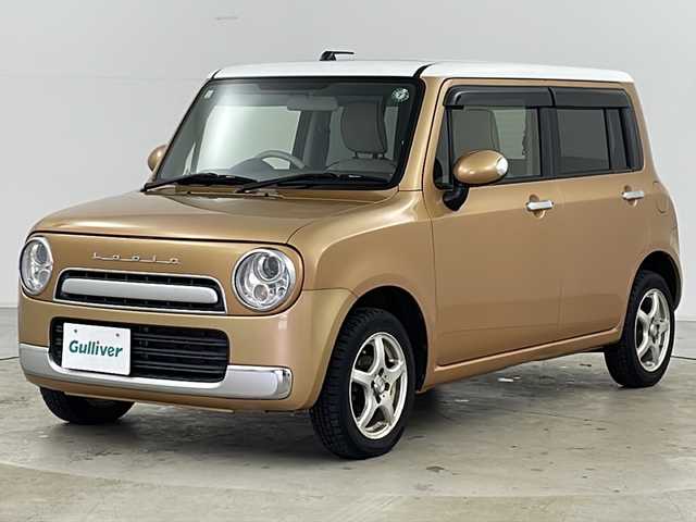 スズキ ラパン ショコラ X 道央・札幌 2015(平27)年 11.7万km キャンドルオレンジメタリック/ホワイト ・純正ナビBT&AUX&USB&HDMI/・4WD/・バックカメラ/・アイドリングストップ/・プッシュスタート/・スマートキー/・ドアミラーヒーター&ウィンカー/・運転席シートヒーター/・専用レザーシート/・革巻ハンドル/・オートライト/・キセノンヘッドライト/・ドアバイザー
