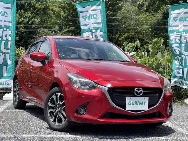 マツダ デミオ XD ツーリング 埼玉県 2015(平27)年 2.7万km ソウルレッドプレミアムメタリック 純正ナビ/フルセグTV/Bluetooth/バックモニター/スペアキ－/ヘッドアップディスプレイ/クルーズコントロール/オートライト/横すべり防止装置/純正マット/純正AW