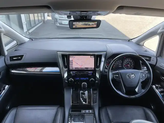 トヨタ アルファード S Cパッケージ 道央・札幌 2018(平30)年 7.6万km ブラック ４WD/社外メモリーナビ/CD/DVD/BT/フルセグ/社外フリップダウンモニター/トヨタセーフティセンス/プリクラッシュセーフティ/横滑り防止装置/レーダークルーズコントロール/レーンキープアシスト/クリアランスソナー/パーキングサポートブレーキ/ロードサインアシスト/バックカメラ/ビルトインETC/デジタルインナーミラー/アイドリングストップ/ECOMODE/両側パワースライドドア/パワーバックドア/前席/２列目パワーシート/D席メモリーシート/前席シートヒーター/前席エアシート/レザーシート/革巻きウッドコンビステアリング/ステアリングリモコン/ハンドルヒーター/AC100V/電動パーキング/ブレーキホールド/MTモード付AT/プッシュスタート/スマートキー/純正リモートスタート/LEDヘッドライト/オートライト/オートハイビーム/フォグランプ/電動格納ミラー/ウィンカーミラー/社外フロアマット/ドアバイザー/スペアキー/TRDエアロ/社外テールランプ