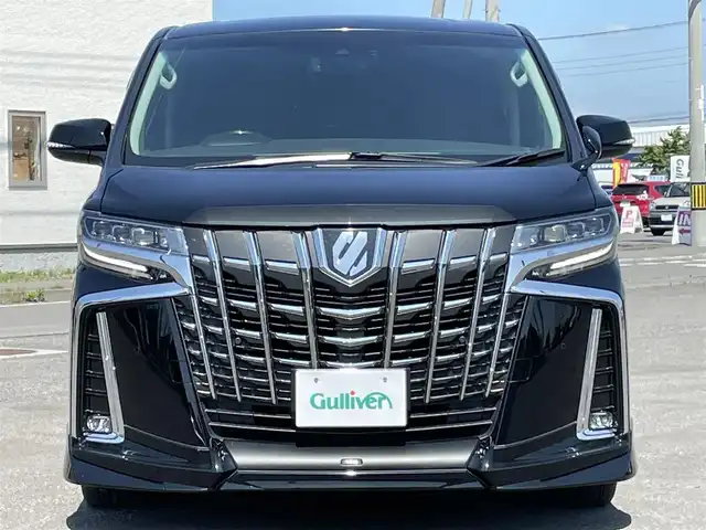トヨタ アルファード S Cパッケージ 道央・札幌 2018(平30)年 7.6万km ブラック ４WD/社外メモリーナビ/CD/DVD/BT/フルセグ/社外フリップダウンモニター/トヨタセーフティセンス/プリクラッシュセーフティ/横滑り防止装置/レーダークルーズコントロール/レーンキープアシスト/クリアランスソナー/パーキングサポートブレーキ/ロードサインアシスト/バックカメラ/ビルトインETC/デジタルインナーミラー/アイドリングストップ/ECOMODE/両側パワースライドドア/パワーバックドア/前席/２列目パワーシート/D席メモリーシート/前席シートヒーター/前席エアシート/レザーシート/革巻きウッドコンビステアリング/ステアリングリモコン/ハンドルヒーター/AC100V/電動パーキング/ブレーキホールド/MTモード付AT/プッシュスタート/スマートキー/純正リモートスタート/LEDヘッドライト/オートライト/オートハイビーム/フォグランプ/電動格納ミラー/ウィンカーミラー/社外フロアマット/ドアバイザー/スペアキー/TRDエアロ/社外テールランプ