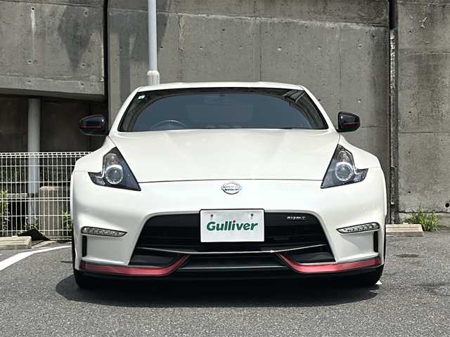 日産 フェアレディ Ｚ ニスモ 愛知県 2019(令1)年 1.7万km ブリリアントホワイトパール nismo専用エアロ/BOSEプレミアムサウンド/純正メーカーHDDナビ/フルセグTV・Bluetooth・CD・DVD・AM・FM・AUX/バックカメラ/純正レカロハーフレザーシート/nismoマフラー/レッドブレーキキャリパー/nismoカーボンキッキングプレート/HIDヘッドライト/純正19インチAW/ビルトインETC/センターコンソール/USBポート/ステアリングスイッチ/スマートキー/プッシュスタート/nismoフロアマット/電動格納ミラー/取扱説明書/保証書/スペアスマートキー