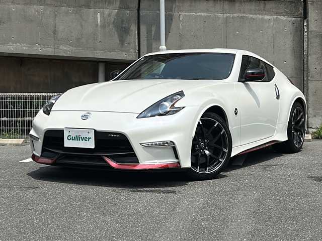 日産 フェアレディ Ｚ ニスモ 愛知県 2019(令1)年 1.7万km ブリリアントホワイトパール nismo専用エアロ/BOSEプレミアムサウンド/純正メーカーHDDナビ/フルセグTV・Bluetooth・CD・DVD・AM・FM・AUX/バックカメラ/純正レカロハーフレザーシート/nismoマフラー/レッドブレーキキャリパー/nismoカーボンキッキングプレート/HIDヘッドライト/純正19インチAW/ビルトインETC/センターコンソール/USBポート/ステアリングスイッチ/スマートキー/プッシュスタート/nismoフロアマット/電動格納ミラー/取扱説明書/保証書/スペアスマートキー