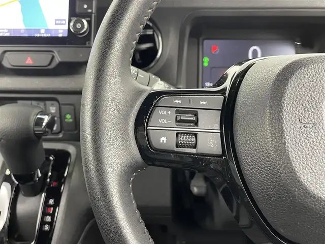 ホンダ Ｎ ＢＯＸ カスタム ターボ 大分県 2024(令6)年 2.2万km ミッドナイトブルービームM ホンダセンシング搭載/・衝突軽減ブレーキ/・先行車発進お知らせ機能/・歩行者事故低減ステアリング/・路外逸脱抑制制御機能/・標識認識機能/・渋滞追従機能付アダプティブクルーズコントロール/・車線維持支援システム/・誤発進抑制機能/・後方誤発進抑制機能/・近距離衝突軽減ブレーキ/・急アクセル抑制機能/・パーキングセンサーシステム/・オートハイビーム/マルチビューカメラシステム/純正9型ナビ　型式：LXU-242NBi/・フルセグTV、CD/DVD、BT対応、USB/・AppleCarPlay、AndroidAuto/ステアリングスイッチ/両側電動スライドドア/前後ドライブレコーダー　型式:DRH-229ND/ETC/ハーフレザーシート/・前席シートヒーター/パドルシフト/電動格納ミラー/純正フロアマット/オートライト/LEDヘッドライト/純正15インチアルミホイール/保証書、取説