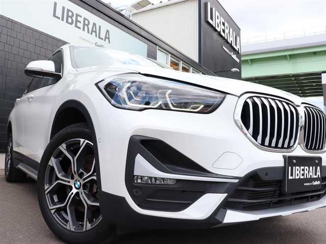 ＢＭＷ Ｘ１ xDrive 18d xライン 宮城県 2020(令2)年 3.8万km ミネラルホワイト コンフォートＰＫＧ/純正ナビ（ＢＴ）/ＬＩＭスイッチ/インテリジェントセーフティ/ダイナミックトラクションコントロール/パークディスタンス/ダウンヒルアシスト/バックカメラ/ドライブモード/ハーフレザーシート/パワーシート（DN席）/メモリーシート（D席）/コーナーセンサー（前後）/デュアルエアコン/電動格納ミラー/ドライブレコーダー（前方）/リヤフォグランプ/フロントフォグランプ/プッシュスタート/コンフォートアクセス/MTモード付/ミラー一体型ETC/純正１８インチAW/純正フロアマット/ＬＥＤヘッドライト/オートライト/アイドリングストップ/禁煙車/カーフィルム/アンビエントライト/電動サイドブレーキ